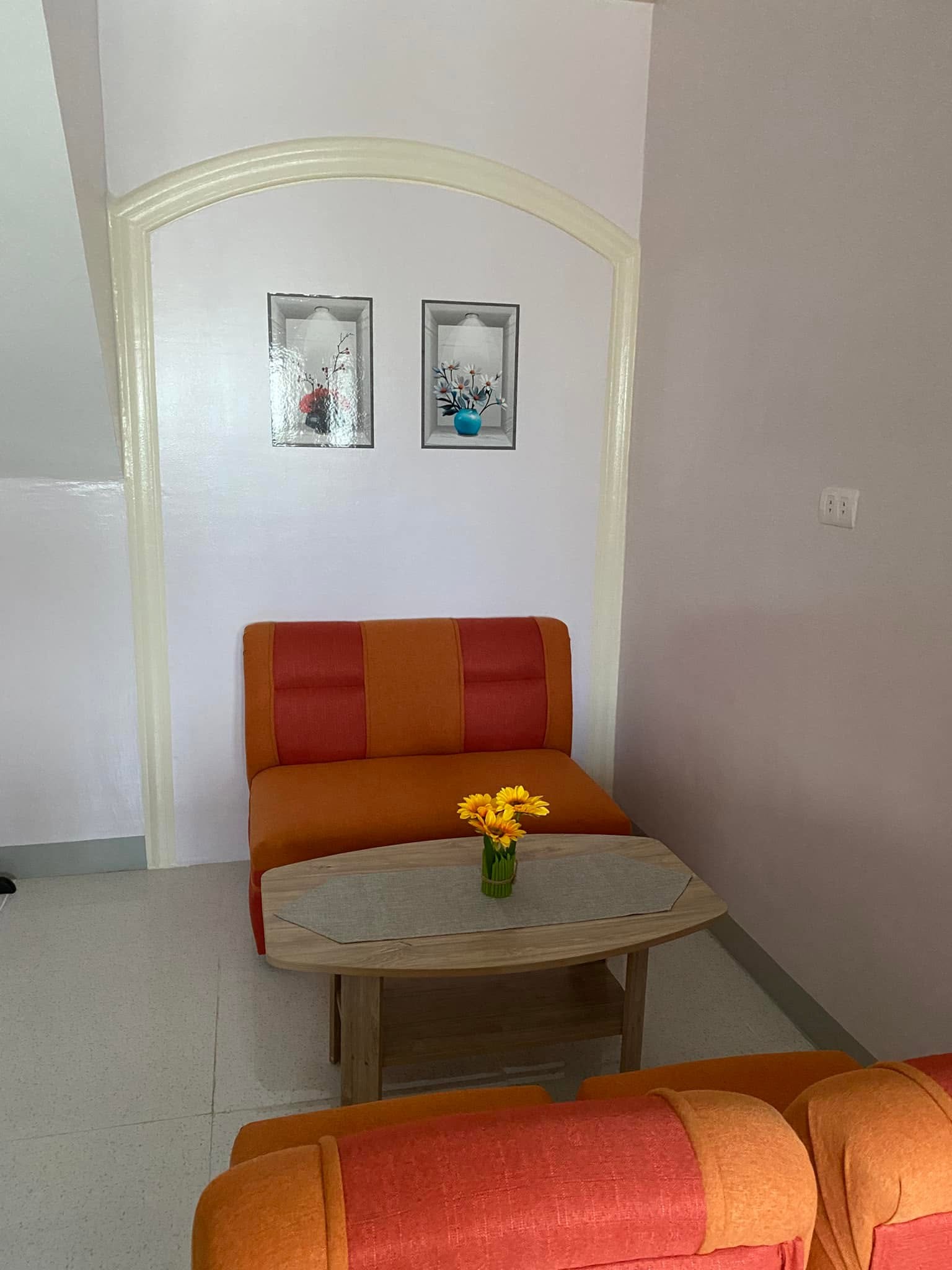 Living room at J&J Apartelle